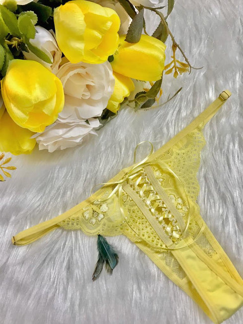 …CALCINHA em renda com laços e regulagem na lateral